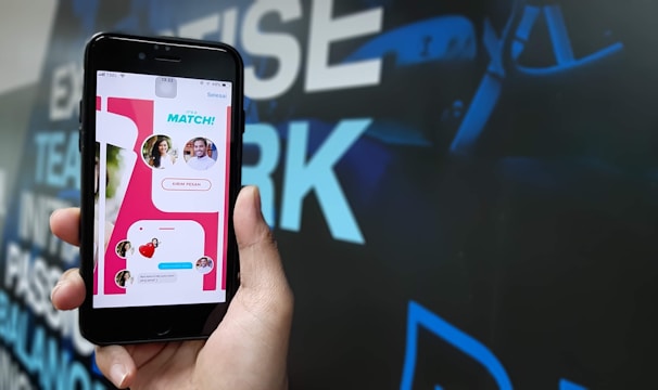 Close-up of a mobile screen showing a bonus notification popping up in a gaming app.