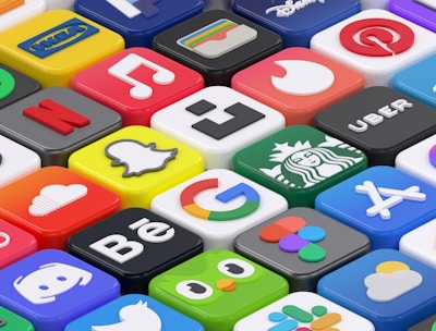 A vibrant grid of popular gaming app icons glowing with bright gradients.